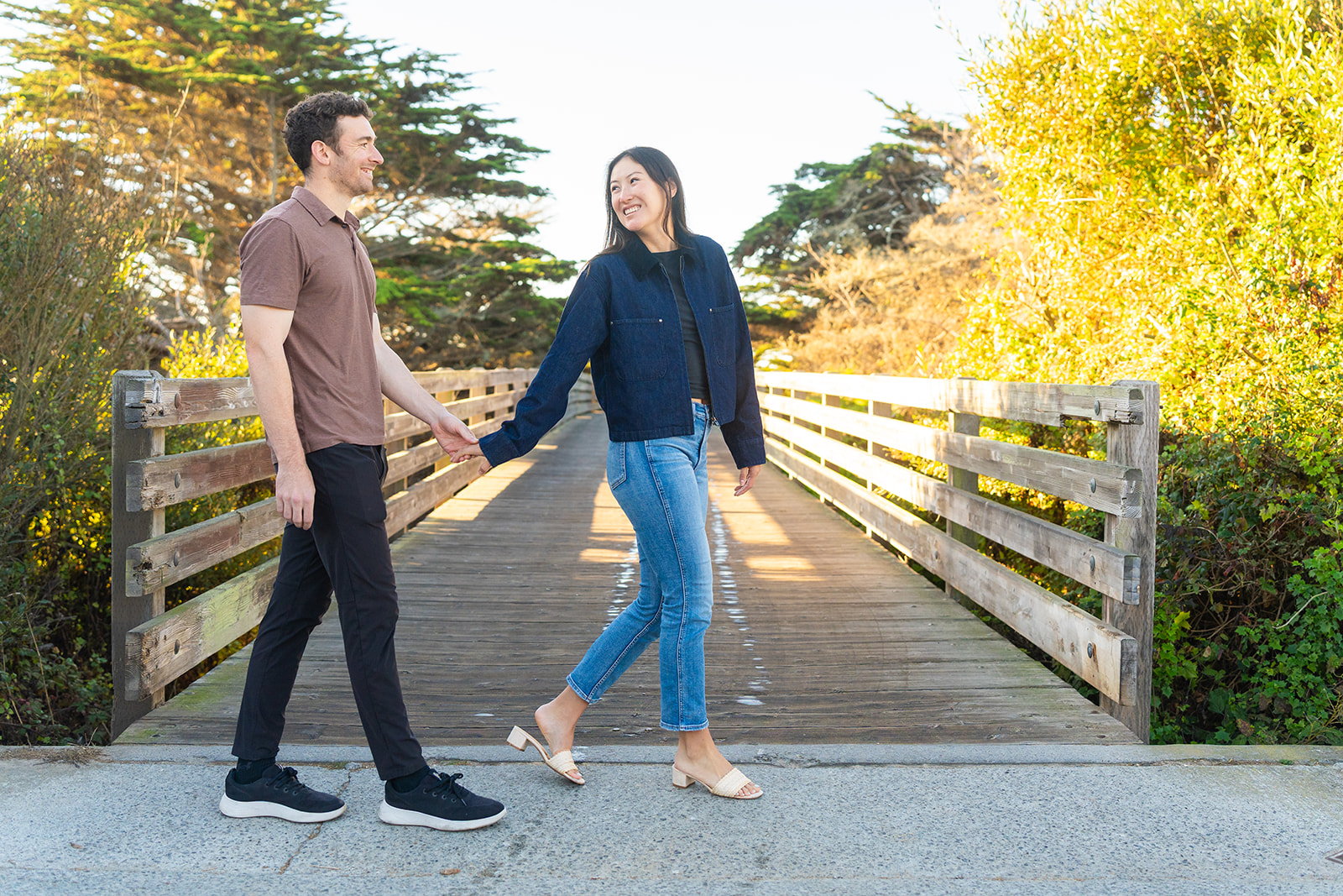 Harrison and Chase walking together by the Half Moon Bay coast
